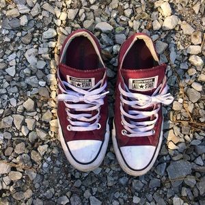 Maroon and white Converse.
